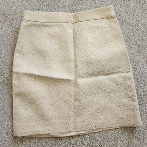 Bebe metallic gold mini skirt